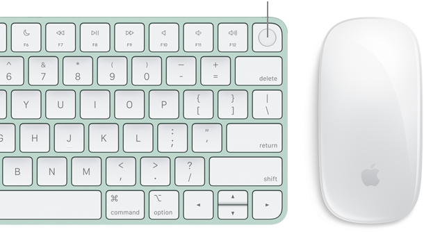 Close-up top view of Magic Keyboard with Touch ID, next to Magic Mouse.